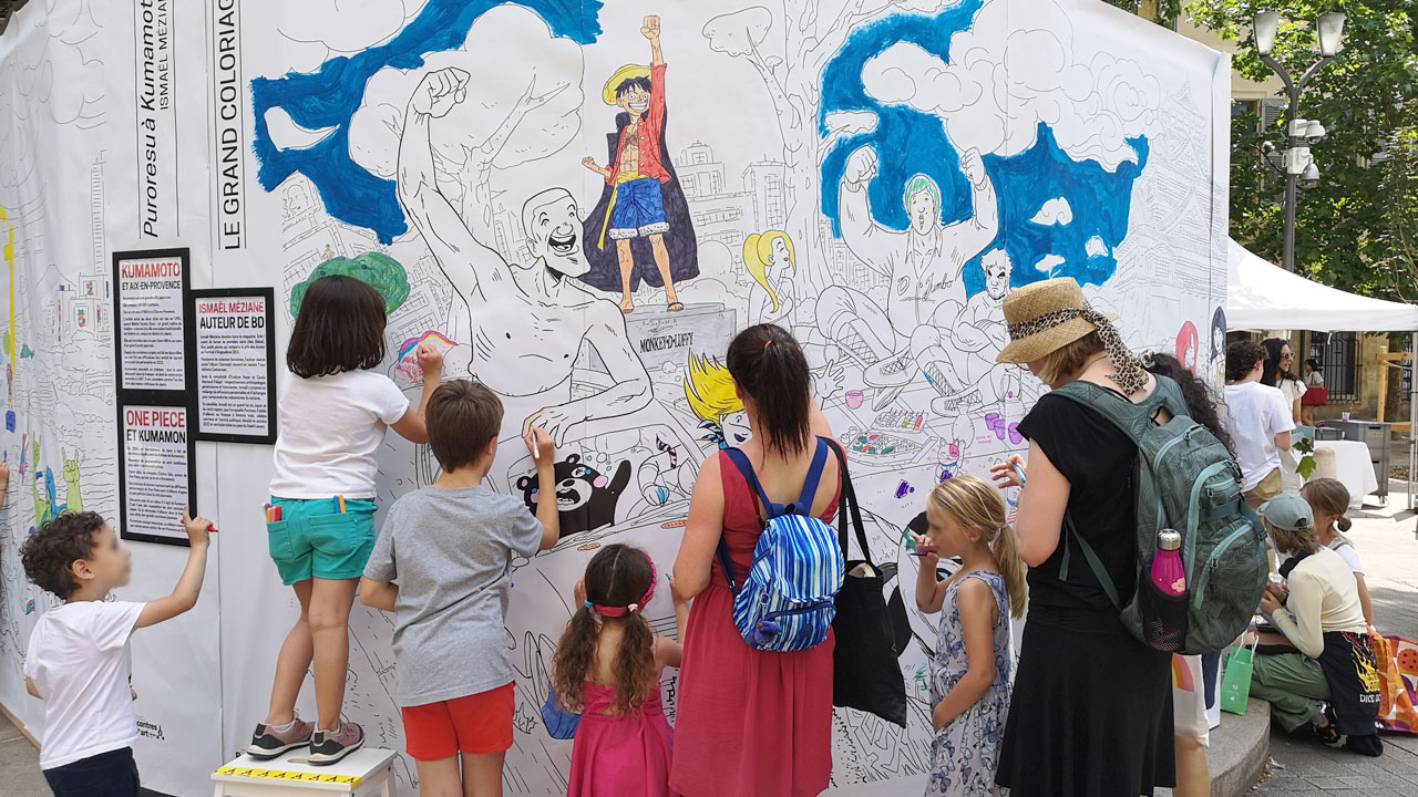 Coloriage de la fresque "Puroresu à Kumamoto" durant l'événement C'est Sud